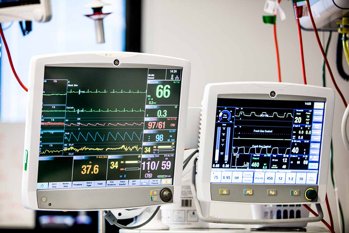 Two patient vital sign monitors